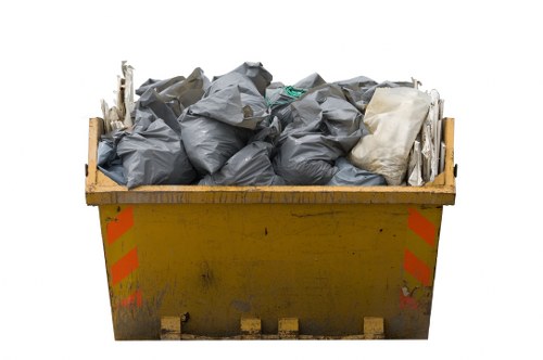 Construction site with a skip container